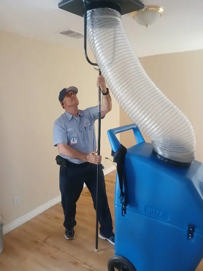 Mini Split Installation technician using HEPA equipment in Orange Beach